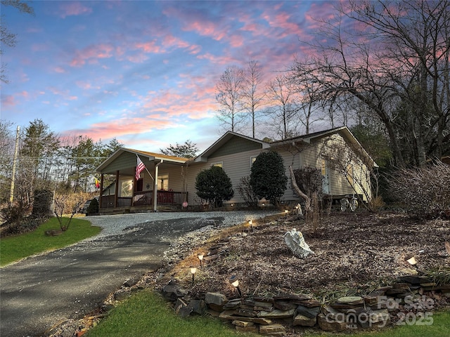 view of front of property featuring covered porch