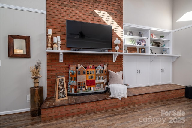 living room with dark hardwood / wood-style flooring