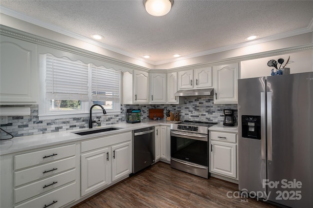 kitchen featuring sink, a textured ceiling, white cabinets, and stainless steel appliances