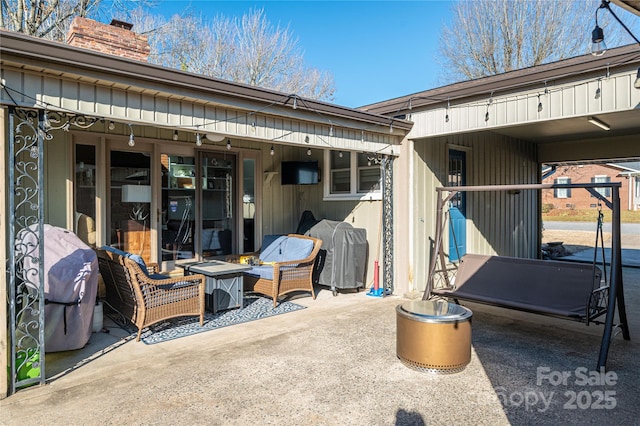 view of patio / terrace with a grill