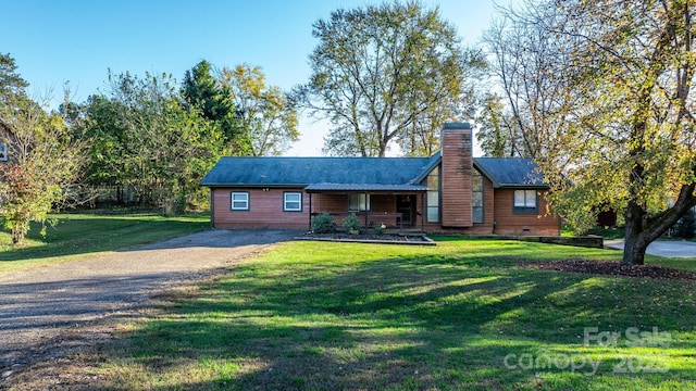 view of front of house featuring a front lawn and a porch