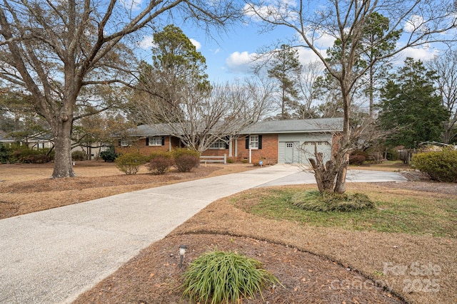 ranch-style house featuring a garage