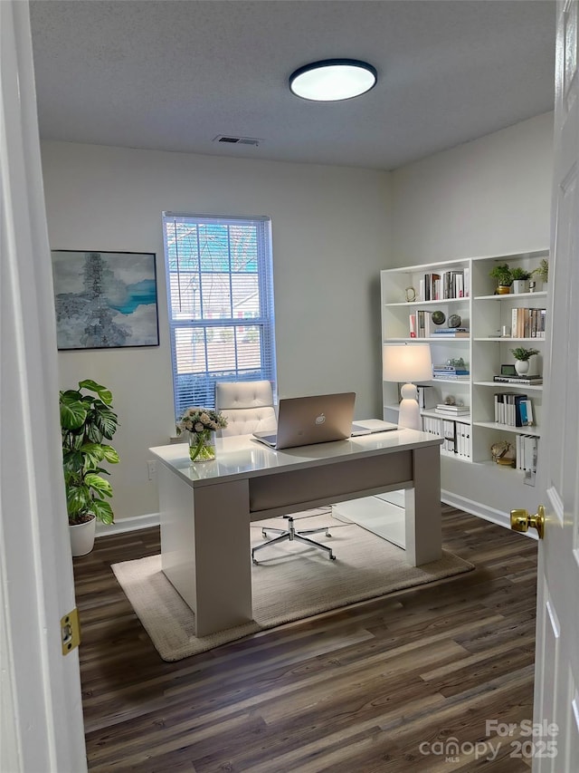 office space featuring dark wood-type flooring