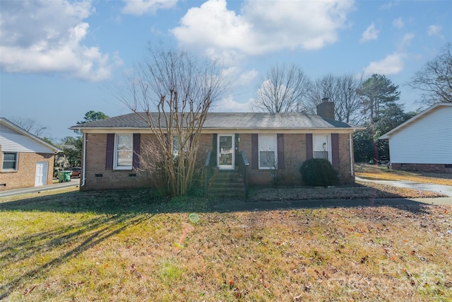 ranch-style home with a front lawn