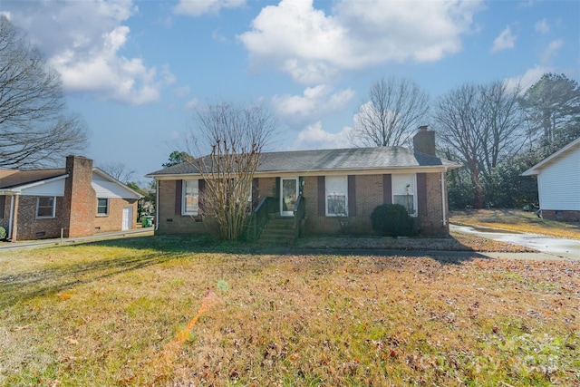 single story home with a front yard