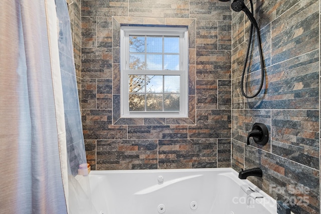 bathroom featuring shower / bath combo with shower curtain