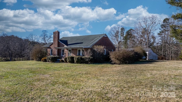 view of property exterior featuring covered porch and a lawn