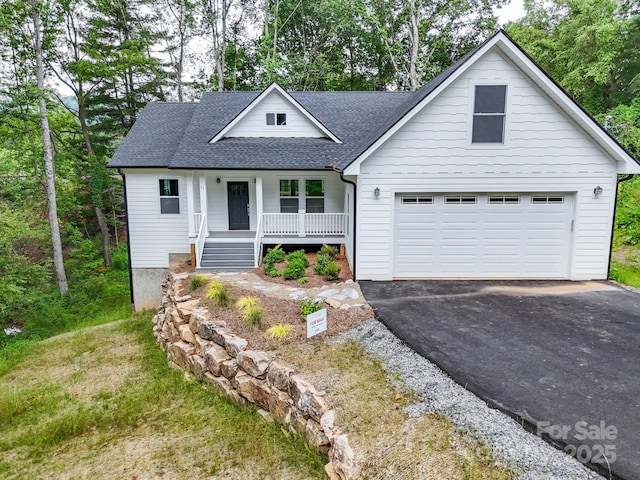 25 Amys Way, Black Mountain, NC 28711 - view of front of property featuring a porch, a shingled roof, and driveway