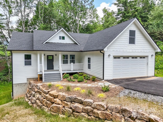 25 Amys Way, Black Mountain, NC 28711 - view of front facade with covered porch, roof with shingles, and asphalt driveway