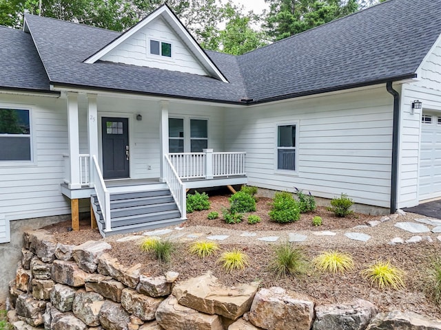 25 Amys Way, Black Mountain, NC 28711 - view of front of house with covered porch, a shingled roof, and an attached garage