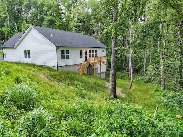 25 Amys Way, Black Mountain, NC 28711 - rear view of property featuring stairs, a deck, a shingled roof, crawl space, and view of scattered trees
