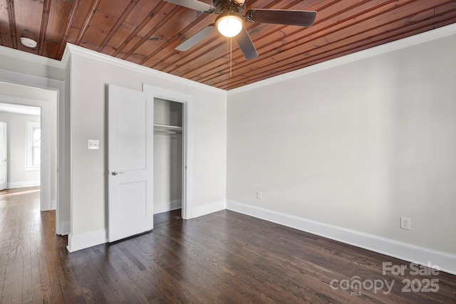 unfurnished bedroom with wood ceiling, ceiling fan, crown molding, and dark hardwood / wood-style floors