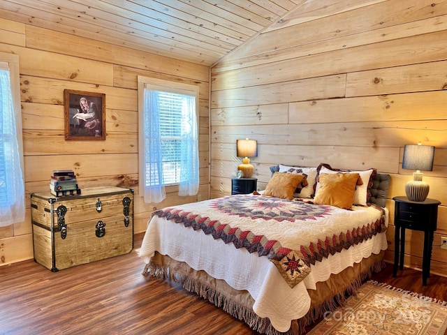 bedroom featuring hardwood / wood-style floors, vaulted ceiling, wooden ceiling, and wood walls