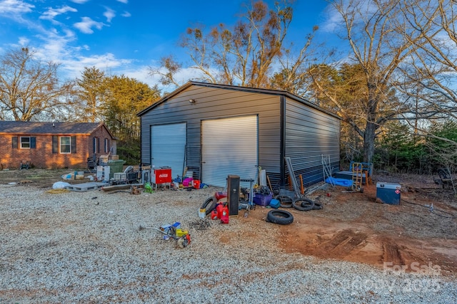 view of outbuilding featuring a garage