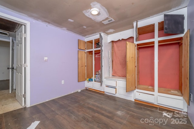 unfurnished bedroom featuring dark wood-type flooring