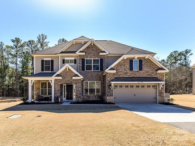 craftsman house featuring a garage and covered porch