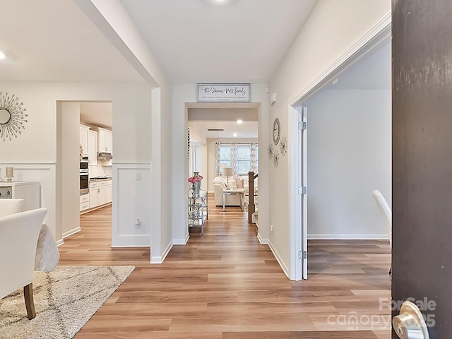 hall featuring light hardwood / wood-style floors