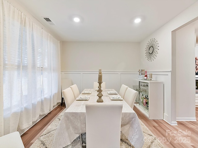 dining room with light hardwood / wood-style floors