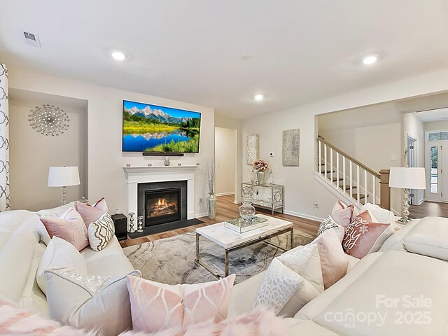 living room with hardwood / wood-style flooring