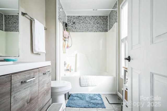 full bathroom with tile patterned floors, vanity, toilet, and shower / bathing tub combination