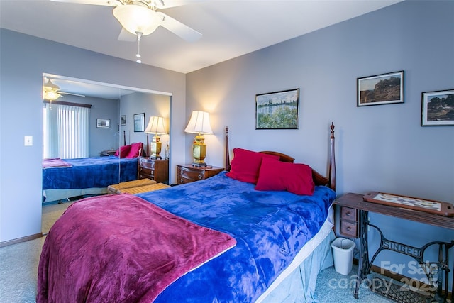 bedroom with a ceiling fan and carpet flooring