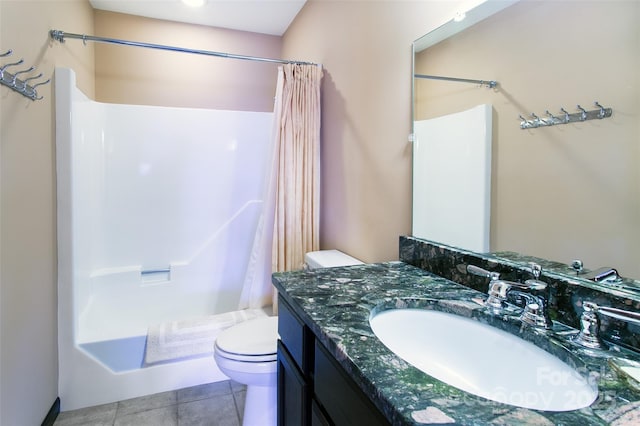 full bath with toilet, shower / bath combo with shower curtain, vanity, and tile patterned floors