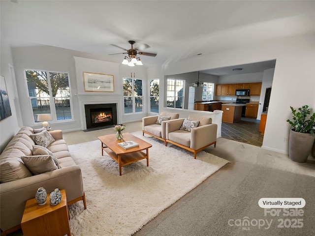 living room featuring ceiling fan