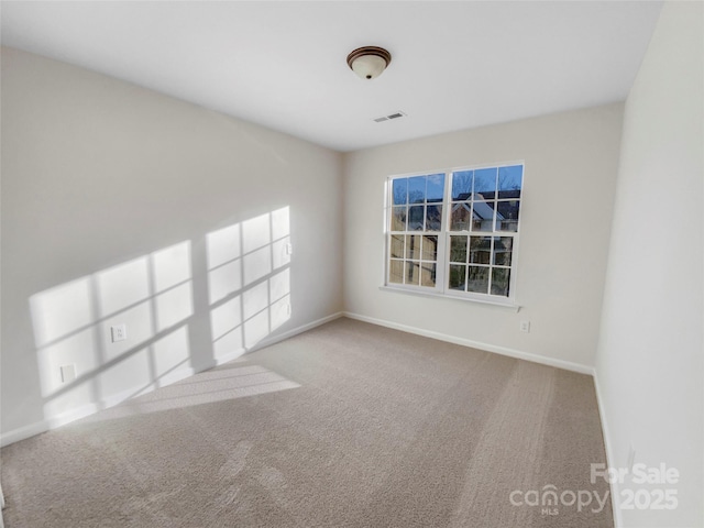 view of carpeted spare room