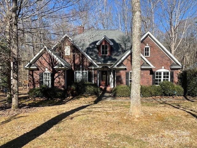 view of front of home with a front lawn