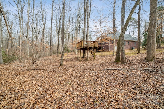 view of yard with a deck