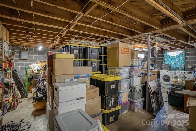 storage room with separate washer and dryer