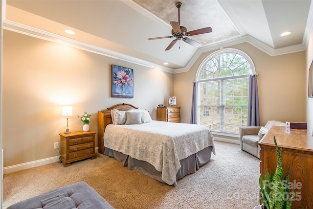 carpeted bedroom featuring vaulted ceiling, ornamental molding, and ceiling fan