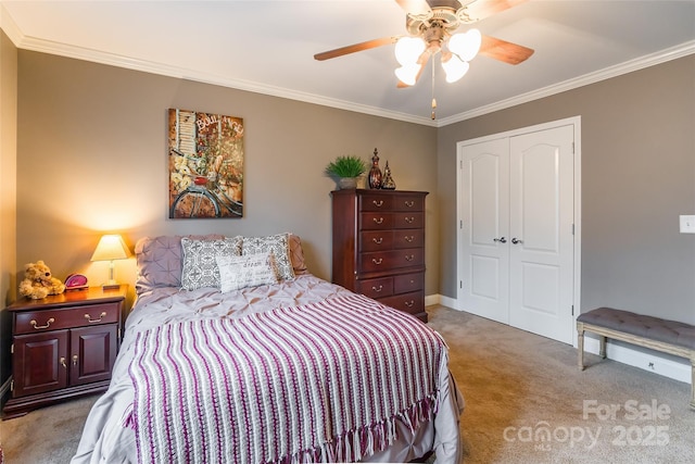 bedroom with crown molding, a closet, ceiling fan, and carpet