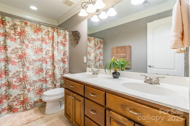 bathroom featuring tile patterned floors, ornamental molding, toilet, and vanity