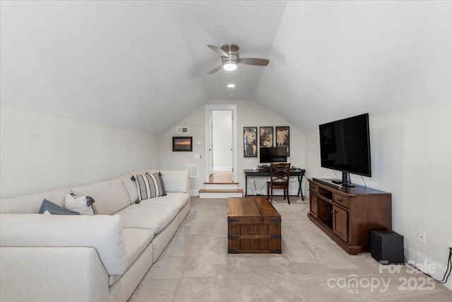 carpeted living room with lofted ceiling and ceiling fan