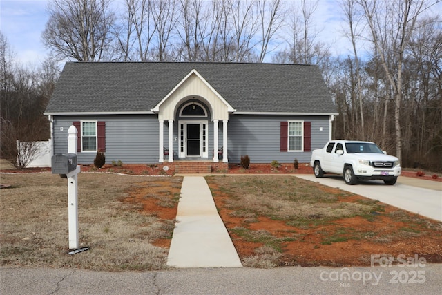 ranch-style house with a front yard