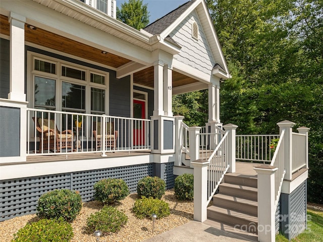 property entrance featuring a porch