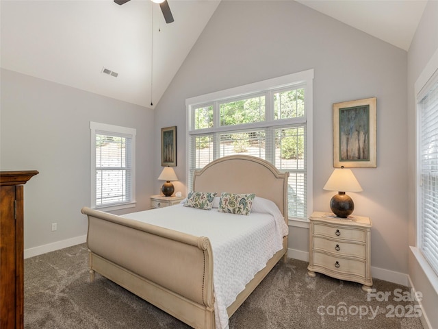 carpeted bedroom featuring ceiling fan, lofted ceiling, and multiple windows