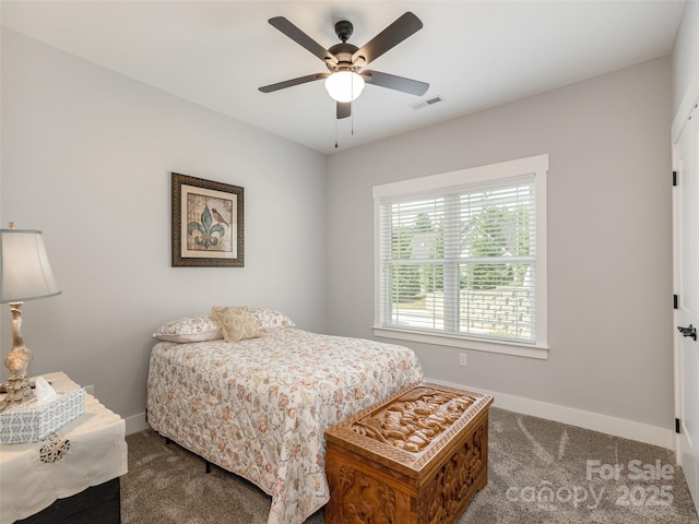 bedroom featuring ceiling fan and carpet floors