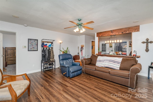 living room with dark hardwood / wood-style floors and ceiling fan