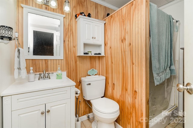 bathroom with wood walls, vanity, toilet, crown molding, and a shower with shower curtain