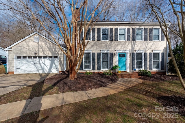 colonial house featuring a garage