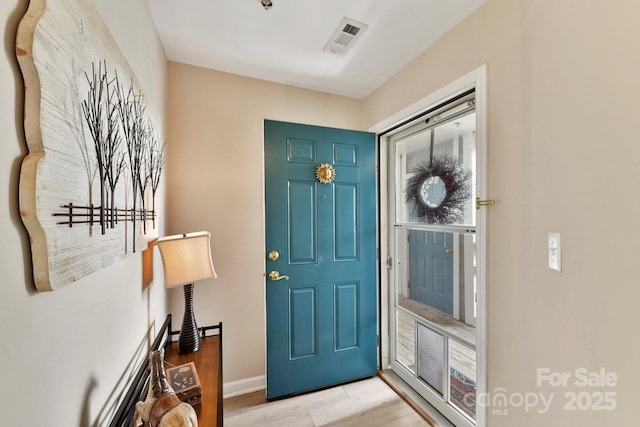 entrance foyer featuring light hardwood / wood-style flooring