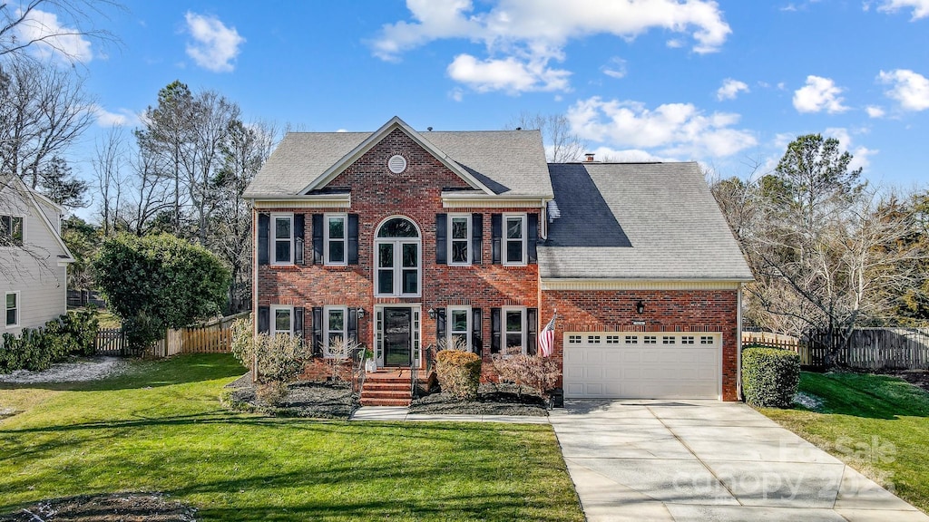 view of front of property with a front lawn