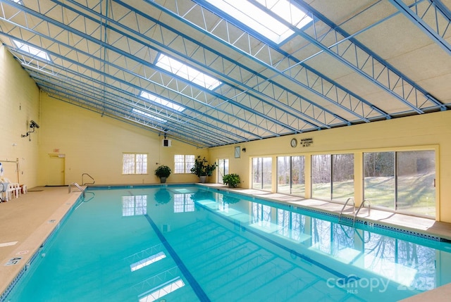 view of pool featuring a skylight