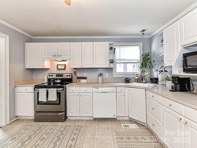 kitchen with white dishwasher, electric stove, and white cabinetry