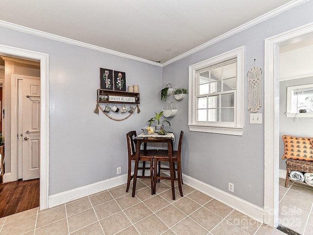 tiled dining space with crown molding