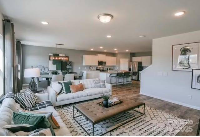 living room featuring wood-type flooring