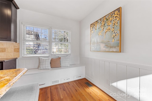 sitting room featuring light hardwood / wood-style floors