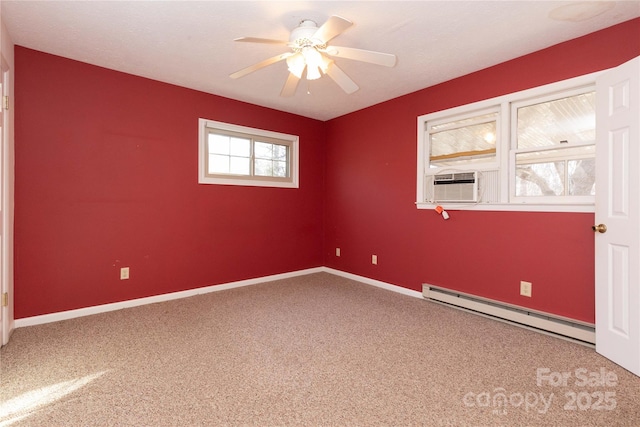 carpeted empty room with cooling unit, ceiling fan, and baseboard heating